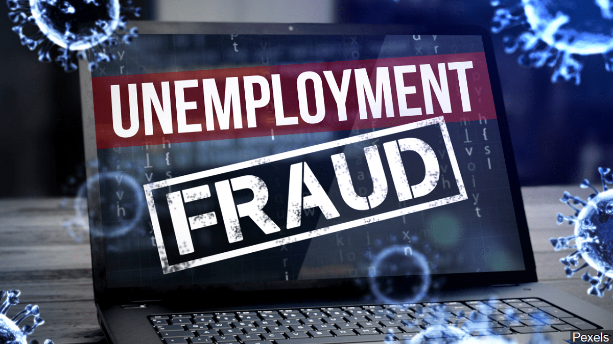 unemployment fraud text on laptop